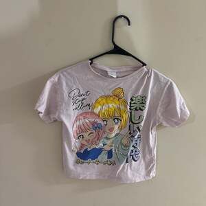 Light Pink Anime Graphic Crop Top "Don't Stop Rolling!"